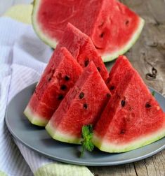 slices of watermelon on a blue plate