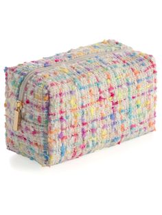 Carry all your odds and ends in style with Shiraleah's Lana Zip Pouch! This petite pouch is the perfect size to store makeup, jewelry, and all your smallest miscellaneous items. Made from vibrant, multicolored tweed fabric, this compact cosmetic case is made from the same trendy material as Shiraleah’s Lana Minaudière and Lana Headband. Pair with other items from the Merry Everything Collection to complete your look! Shiraleah is a trend-driven lifestyle brand focused on the little gifts that ma Multicolor Pouch Cosmetic Bag As Gift, Multicolor Coin Purse With Removable Pouch For Travel, Multicolor Travel Pouch Cosmetic Bag, Multicolor Zipper Pouch Cosmetic Bag, Multicolor Pouch Cosmetic Bag, Multicolor Rectangular Cosmetic Bag With Zipper, Multicolor Travel Cosmetic Pouch, Multicolor Coin Purse With Removable Pouch, Multicolor Rectangular Cosmetic Bag With Removable Pouch