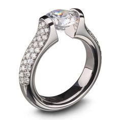 a white gold ring with diamonds on it