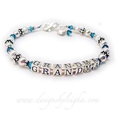 "This birthstone bracelet for Grandma or Grammie is made with alphabet block letters with kids' or grandkids' names. The bracelet with the kid's (or grandkid's) names is sometimes called a Mother's Birthstone Bracelet but whatever you call it - it is a fun gift to give yourself or someone you love to show off their kid's or grandkid's. Some of the Name Bracelets are shown with add-on charms. This bracelet starts at $49 (.925 sterling silver and Swarovski) without charms or dangles. We have 100's Anniversary Sterling Silver Jewelry With Letter Beads, Personalized Silver Name Bracelet With Round Beads, Personalized Blue Charm Bracelet For Birthday, Personalized Sterling Silver Bracelets With Round Beads, Customizable Silver Name Bracelet With Round Beads, Birthday Bracelets With Name On Round Beads, Personalized Silver Beaded Bracelets For Anniversary, Sterling Silver Letter Beads Jewelry For Gifts, Spiritual Silver Jewelry With Letter Beads