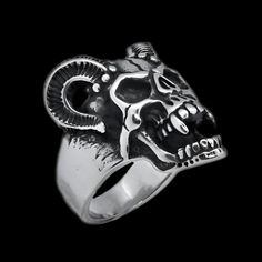 Introducing our Demon Vampire Ring, a bold and daring accessory for those who love to stand out from the crowd. Expertly crafted from high-quality stainless steel, this ring is built to last and designed to impress. With its unique and intricate design, the Demon Vampire Ring is sure to turn heads and make a lasting impression. Featuring a menacing demon and vampire design, this ring is perfect for those who appreciate gothic and occult styles. This ring is the perfect way to add some edge to yo Gothic Stainless Steel Skull Ring, Gothic Skull Ring In Stainless Steel For Halloween, Punk Stainless Steel Rings For Halloween, Gothic Silver Stainless Steel Ring, Demon Vampire, Vampire Design, Vampire Ring, I Love You Ring, Unique Jewelry Designs