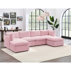 a pink sectional sofa in a living room