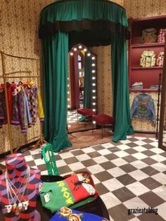 a room filled with lots of clothing and accessories