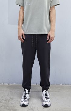 PacSun Exclusive! The Comfort Performance Jogger Sweatpants from A.R.C. Activewear by PacSun are part of our Comfort Series, crafted with soft fabrics ideal for lounging yet designed for optimal performance. Featuring 4-way stretch, an elasticated waistband, hidden zip pockets, and a reflective exposed ticked drawcord with rubber tips, these joggers provide high recovery and flexibility, perfect for both relaxation and activity.


	Performance sweatpants
	Reflective drawcord
	Elasticated waistline
	4-Way stretch
	Single zip pocket
	Key loop detail
	High recovery
	88% Polyester, 12% spandex
	11" Leg opening
	27" Inseam
	Measurements taken from size medium
	Machine washable
	Model is wearing size medium
	Model Measurements: 6'1” Height, 34.5” Chest, 29" Waist Comfort Stretch Sportswear Bottoms, Casual Comfort Stretch Straight Sweatpants, Casual Straight Comfort Stretch Sweatpants, Casual Comfort Stretch Sweatpants, Sporty Relaxed Fit Lounge Pants, Sporty Relaxed Fit Lounging Pants, Moisture-wicking Loungewear Pants, Sportswear Go-dry Pants For Loungewear, Comfort Stretch Moisture-wicking Sweatpants