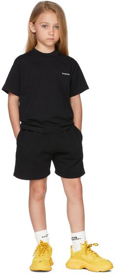 Cotton fleece shorts in black featuring logo printed in white at front . · Mid-rise · Two-pocket styling · Elasticized waistband · Machine wash Model measures 48 / 122 cm tall and wears size 6. Supplier color: Black Size: child's height 2: 35.75 / 91 cm 4: 41.25 / 105 cm 6: 46.75 / 118.5 cm 8: 52.25 / 132.5 cm 10: 55.35 / 140.5 cm Jogging Shorts, School Clothes, Fleece Shorts, Kids Black, Home Products, Cotton Fleece, Sport Wear, Black Logo, Amelie