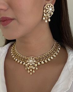 Discover the timeless elegance of our SoniGal Kundan Necklace, a stunning piece that effortlessly blends traditional Indian craftsmanship with modern sophistication. This lightweight necklace features exquisite Kundan stones that catch the light beautifully, making it the perfect accessory for any occasion, from casual outings to formal events. Key Features: Versatile Design: Perfect for pairing with both Indian and Western outfits, this necklace is a must-have addition to your jewelry collection. Lightweight Comfort: Enjoy all-day wear without the weight, making it ideal for long events or daily styling. Handcrafted Quality: Each piece is meticulously crafted to ensure you receive a unique work of art that embodies elegance and grace. Why You'll Love It  This Kundan necklace is not just j Light Weight Kundan Necklace, Elegant Festive Diamond Jewelry, Elegant Gold Chandbali Kundan Necklace, Ceremonial Gold Kundan Necklace, Elegant Temple Necklace With Meenakari, Elegant Gold Kundan Jewelry, Elegant Kundan Jewelry With Intricate Design, Elegant Ceremonial Meenakari Jewelry Sets, Elegant Hand Set Gold Kundan Necklace