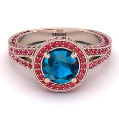 When you will get this Milgrain Round Blue Topaz Engagement Ring, you’ll discover what a true mix of beauty and comfort looks and feels like. It has a magnificent round Blue Topaz and small round rubies covering and embellishing the split of the band. It’s extremely comfortable on top of that. Stock Number: 6403Blue Topaz Metal Setting Metal Type: 14K Rose Gold Main Stone Type: 100% Natural Blue Topaz Size: 0.84Ct / 6mm Shape: Round Cut Color: Blue Clarity: VS Additional Stones Stone Type: 100% Blue Topaz Engagement Ring, Topaz Engagement Ring, Natural Sapphire, Natural Ruby, Gold Platinum, Necklace Sizes, Cut And Color, White Diamond, Black Diamond