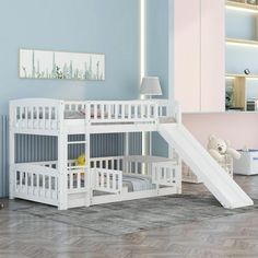 a child's bedroom with a slide and bunk bed