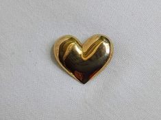 Vintage gold tone brooch. Heart shaped. Polished mount. Classic love gift. Gift idea. Free Global Shipping. Free global shipping  from my vintage store, Bags Of Fun in Cyprus. If you are outside of the EU customs charges may apply.   Non-EU customers need to provide a Telephone number and/or email address for the Custom's Declaration (this is not included on the envelope). This is required in case Customs need to contact you regarding your order.  If you're in the EU you have the right to return Vintage Gold Heart Brooches, Gold Heart Brooch For Formal Occasions, Gold Heart-shaped Brooch For Formal Occasions, Gold Heart Brooch For Formal Wear, Vintage Gold Brooches For Valentine's Day, Gold Brooches For Valentine's Day Formal, Gold Brooches For Formal Valentine's Day, Gold Brooches For Valentine's Day, Gold Heart Brooches For Wedding