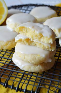 lemon cookies with icing on a cooling rack