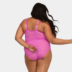 A gorgeous bodysuit with a romantic floral pattern that doesnt show through under your clothes. Soft all-over lace is semi sheer opacity due to the floral design, providing more modest coverage yet still lightweight and breathable. 360 degrees of stretch that supports for easy all-day wear and comfort. This plus size floral lace bodysuit gives you sexy style & ultimate comfort in one. Smooth to the touch, made of one layer of stretch lace with mesh. Bottom hook and eye adjustability makes this b Sleeveless Lace Bodysuit With Built-in Bra, Lace Shapewear Bodysuit With Lined Body, Sleeveless Lace Bodysuit With Lined Body, Lace Camisole Bodysuit With Built-in Bra, Lace Stretch Bodysuit With Underwire, Stretch Lace Bodysuit With Underwire, Stretch Lace Underwire Bodysuit, Lace Shapewear With Lace Closure, Feminine Lace Bodysuit With Lined Body