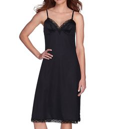 This full slip is the perfect underpinning for longer dresses and skirts, with adjustable straps and pretty lace trim. Made of 100% nylon knit. Wireless cups have two darts for shape. Non-stretch lace along neckline Satin straps adjust in front with plastic hardware. Long length is perfect for longer dresses. Made of lustrous stretch nylon knit. A lingerie must-have. Vanity Fair Women's Rosette 26 Inch Lace Full Slip in Midnight Black (1010326) | Size 34 | HerRoom.com Lace Slip Dress With Built-in Bra For Daywear, Fitted Slip Dress With Delicate Straps For Daywear, Lace Slip Dress With Delicate Straps For Daywear, Lace Slip Dress With Adjustable Spaghetti Straps, Lace Slip Dress With Delicate Straps In Camisole Style, Lace Camisole Slip Dress With Delicate Straps, Lace Camisole Slip Dress With Adjustable Straps, Elegant Stretch Cami Slip Dress, Lace Camisole With Lace Trim For Daywear