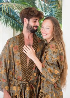 **'MOONLIT PETALS' SILK KIMONO ROBE FOR MEN**   Whether you're enjoying a cup of coffee on a sunlit balcony, relishing a leisurely breakfast, or unwinding in the evening, our luxury silk kimono robe transforms ordinary moments into cherished rituals. Designed by us and lovingly handcrafted by skilled artisans in Bali, Indonesia, this robe is more than just a garment--it's a reminder to embrace the present, breathe deeply, and celebrate the simple joys of life. ✨ **DESIGNED WITH PRACTICAL FEATURE Robe For Men, Satin Dressing Gown, Joys Of Life, Indonesian Batik, Silk Kimono Robe, Long Holiday, Satin Kimono, Simple Joys, Gray Silk