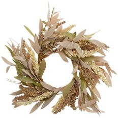 a wreath made out of dried flowers and leaves