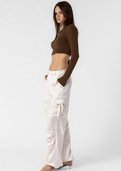 The Gigi Satin Cargo Pant is made from luxurious satin material, offering both style and comfort. With its cargo design, it adds a touch of practicality to your wardrobe. Elevate your look with these sophisticated pants. Model information height: 5’9” | bust: 30½ | waist: 23½ | hip: 33½ model is wearing a size s Satin Cargo Pants, Cargo Design, Pants Model, Huge Sale, Cargo Pant, Satin Material, Cargo Pants, Clothing And Shoes, Champagne