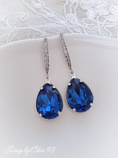 "Sapphire Blue Swarovski Crystal Silver Necklace Beautiful top quality Swarovski crystal earrings. Made with bright sapphire blue crystals, etched silver cups, dainty silver chain. Lightweight and very comfortable to wear. Pendant measures 1 x 1/2\" The chain is 18\", finished with 3\" extension chain and silver lobster clasp. SimplyChic pays big attention to the quality of all my designs. I attached a few pictures to show the unique and delicate frames used to showcase these beautiful Swarovski Formal Blue Crystal Earrings, Formal Sapphire Crystal Earrings, Sapphire Crystal Drop Earrings, Blue Dangle Crystal Earrings For Formal Occasions, Blue Sterling Silver Crystal Earrings For Formal Occasions, Blue Sterling Silver Crystal Earrings For Formal Events, Elegant Blue Rhinestone Earrings, Elegant Blue Sparkling Jewelry, Elegant Sparkling Blue Jewelry