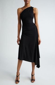 Captivate from and with every angle in this one-shoulder midi featuring an oppositely sloped asymmetric hem and ruching to elegantly enhance the drape. 48" to 58" length (size 12) Hidden side-zip closure One-shoulder neck 95% viscose, 5% elastane Dry clean Made in Italy Designer Clothing Black One Shoulder Dress, Black Knee Length Dress, Summer Wardrobe Essentials, Wedding Guest Shoes, Michael Kors Collection, Made Clothing, Denim Leggings, Comfortable Dress, Toddler Girl Outfits