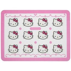 a hello kitty mat with pink bows on it