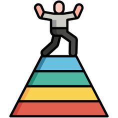 a man standing on top of a rainbow colored pyramid