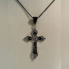 Unisex Women Men Black And Silver Tone Cross Pendant Necklace. Lovely Black And Silver Tone Cross Pendant On A Black Necklace, Perfect Addition To Your Necklace Collection. Looks Great With Simple Or Fancy Outfits. *Brand New. *Necklace Length: 50cm. *Necklace Material: Stainless Steel. *Necklace Color: Black. *Cross Size: 5.5cm X 3.7cm. *Cross Material : Zinc Alloy. *Will Ship Next Day Or Same Day If Possible. *Make A Bundle Of 2 Or More Items And Save $2 (Message Me First!) #Gothicnecklace#Rel Necklaces With Crosses, Cross Necklace Black, Cross Gothic, Crucifix Necklace, New Necklace, Necklace Collection, Gothic Necklace, Black Cross, Vintage Gothic