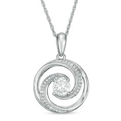 Dazzle her with this alluring fashion pendant. Crafted in sterling silver, this entrancing design sparkles with a 5.0mm lab-created white sapphire centred in a swirling open circle. Diamond accents and beaded detailing adorn the spiraling ribbons and linear bail to complete this look. Buffed to a brilliant lustre, this pendant suspends along an 18.0-inch rope chain that secures with a spring-ring clasp. Zales Zales, Wave Pendant, Diamond Pendants Designs, Diamond Pendant Sets, Fashion Pendant, Diamond Jewelry Designs, Circle Diamond, Antique Engagement Rings, Mens Silver Rings