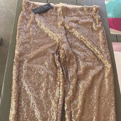 Want To Look Awesome While Still Getting To Wear Your Favorite Pants? These Gold Sequin Leggings Are Just The Thing. Measure Approximately 39 Inches Top Of Pants To Tip Of Pants Legs. Beautiful Sequins Add The Touch Of Elegance To Dress Up An Outfit. Could Even Be Worn Casual With T-Shirt And High-End Sneakers. Has A Comfortable Looking Liner Inside. Retail $39.98 Gold Sequin Leggings, Sequin Leggings, And July, Gold Sequin, The Thing, To Look, Pant Jumpsuit, Sequin, That Look