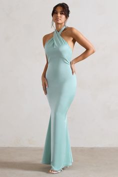 Exude confidence at your next event in this show-stopping maxi. Unbeatable. Arriving in a soft mint green hue of a premium satin. this backless piece features a cross over halter-neck thats finished with wide self-tie straps for the perfect custom fit. For an elegant bridesmaid attire. try styling yours with our Just A Fling court shoes. Features - Premium satin- Cross over halter neckline- Open back- Invisible zip closure - Fishtail skirt- Maxi length Sizing & Fit Model is 5'8 and wears UK size 8 / US size 4 Product Information Designed exclusively by Club L London Partially lined with no stretch Premium satin in Mint (100% Polyester) 155cm total length SKU: CL129991003 Elegant Floor-length Maxi Dress With Crisscross Straps, Maxi Dress With Crisscross Straps For Night Out, Floor-length Maxi Dress With Crisscross Straps For Evening, Green Halter Neck Maxi Dress For Prom, Elegant Cross Back Maxi Dress For Night Out, Elegant Cross Back Backless Dress For Prom, Fitted Cross Back Maxi Dress For Party, Green Halter Neck Evening Dress For Gala, Fitted Cross Back Maxi Dress For Night Out