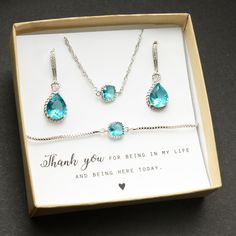 Aquamarine blue silver Personalized Bridesmaid Gift teal blue Bridesmaid Jewelry Set Bridesmaid Earrings Necklace Bracelet Bridal Party Gift We carefully choose our jewelry supplies keeping in mind there are many customers with sensitive skin, not to mention to ensure high quality and durability of the pieces! You can enjoy these pieces for a long long time!  ----------------------------------------------------------------------------- -Available in high quality 18kRose gold, White gold, and yellow gold plated settings. They are tarnish resistant and are hypoallergenic  . Free message cards, high quality gift boxes -earrings : with AAA grade cubic zirconia .Comes with secured rhinestone hook ear wires . , crystal tear drops  ( you choose the color ).  Earrings are also available with clip Elegant Turquoise Jewelry Set For Party, Blue Jewelry Sets For Wedding, Blue Jewelry With Matching Earrings For Bridesmaid Gift, Elegant Turquoise Wedding Jewelry Sets, Elegant Turquoise Jewelry Sets For Wedding, Silver Jewelry Sets For Bridesmaids, Turquoise Sterling Silver Jewelry For Party, Sterling Silver Blue Jewelry For Bridesmaid Gift, Blue Sterling Silver Jewelry For Bridesmaid Gift