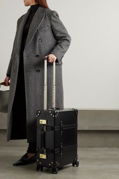 Globe-Trotter's 'Centenary' collection marks 100 years of the brand's most iconic luggage. This carry-on suitcase is made from the brand's patented vulcanized fiberboard that's lightweight but ultra-durable, and finished with supple leather accents at the corners. There's space inside for two to three days' worth of clothes and cosmetics. Carbon steel locks ensure peace of mind when travelling. Travel Globe, Carry On Suitcase, Sport Swimwear, Sports Skirts, 100th Anniversary, Jo Malone London, Globe Trotter, Skirt Top, Net A Porter