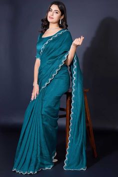 Elevate your elegance with this Designer Khadi Shimmer Saree, a perfect blend of traditional charm and modern allure. Crafted from luxurious Khadi Shimmer fabric, this saree features exquisite border work that gracefully frames the drape, adding a touch of sophistication to every pleat. The matching blouse, also in Khadi Shimmer, complements the saree for a seamless, radiant look. Slight color variations may occur due to digital imaging. Accessories shown are for styling purposes only and not in Lehenga Suit, Shimmer Fabric, Digital Imaging