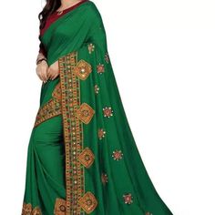 Beautiful Embroidered Saree For Women Style Code - Embroidery Silk Saree Pattern - Embroidered Pack Of - 1 Color - Green/Gold Occasion - Wedding, Party & Festive Type Of Embroidery - Aari Bharat Work Hand Embroidery - Yes Decorative Material - Mirror, Decorative Stones, Lace Embroidery Method - Hand Construction Type - Embroidered Fabric Care - Dry Clean Only Other Details This Beautiful Traditional Sari Is Elegantly Decorated With Gorgeous Embroidery And Pattern That Gives A Perfect Look To The Embroidered Semi-stitched Choli With Traditional Drape, Green Embroidered Choli For Navratri, Embroidered Green Choli For Navratri, Embroidered Semi-stitched Choli For Eid, Eid Semi-stitched Embroidered Choli, Bollywood Style Green Embroidered Choli, Eid Embroidered Semi-stitched Choli, Green Art Silk Fabric With Intricate Embroidery, Intricate Embroidery Green Art Silk Fabric