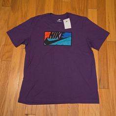 Nwt Men's Large Nike Purple Short Sleeve T-Shirt Casual Purple Shirt With Graphic Print, Sporty Purple T-shirt With Graphic Print, Sporty Purple Tops With Graphic Print, Nike Purple Crew Neck T-shirt, Purple Graphic Tee With Logo Print, Purple Sports T-shirt With Logo Print, Sports Purple T-shirt With Logo Print, Sports T-shirt Purple With Logo Print, Purple Crew Neck T-shirt For Sports