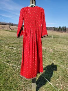 Vintage Red Floral Afghan Kurti Dress Size Small - Etsy Red Long Sleeve Embroidered Fitted Dress, Folk Style Red Maxi Dress, Traditional Red Tunic Dress, Red Long Embroidered Dress, Red Long Sleeve Embroidered Dress For Festivals, Red Bohemian Dress For Festive Occasions, Festive Long Sleeve Folk Dress, Festive Bohemian Red Dress, Festive Red Bohemian Embroidered Dress