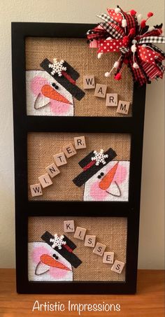 a wooden frame with words and a snowman on it