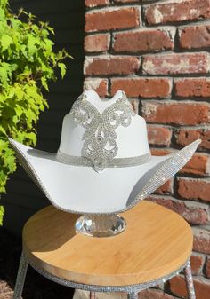 Elegant White Hat With Rhinestones, White Western Hat With Rhinestones, White Hats With Rhinestones And Curved Brim, White Rhinestone Hat With Curved Brim, White Party Hat With Rhinestones, White Tall Crown Hat With Adjustable Fit, White Adjustable Hat With Tall Crown, White Adjustable Tall Crown Hat, Western Style Fitted Wedding Hat