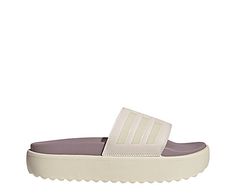 adidas Adilette Platform Womens Slide Sandal Step up your Slide look in the adidas Adilette Platform women s Slide Sandal. With a faux leather upper featuring the 3-Stripes for extra style, this Slide is cool and comfy. The contoured footbed cradles and cushions your foot, while the platform keeps you lifted. Synthetic upper Slip-On Textile liningContoured footbedEVA platform/outsole Adidas Synthetic Sport Sandals With Cushioned Footbed, Adidas Synthetic Sport Sandals For Spring, Adidas Sport Sandals For Spring Sports, Adidas Sporty Sport Sandals For Spring, Sporty Adidas Sandals In Synthetic Material, Adidas Sandals With Logo, Synthetic Material, Sporty Adidas Sandals With Synthetic Material, Spring Adidas Logo Open Toe Sandals, Sporty Adidas Sandals With Adidas Logo