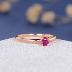 Ruby Ring Rose Gold Engagement Ring Ruby Band July Birthstone Ring Stacking Wedding Band Women Antique Engraving Simple Anniversary Gift Metal Type: Solid 14K Rose Gold Band Width: 1.7/1.4mm Size: US3-10 Center Stone: 4mm Natural Ruby Weight: 0.14CT Color: Red √ CUSTOM √ LAYAWAY √ ENGRAVING √ GIFT WRAPPING All our jewelry is 100% authentic. Please check the availability of selected gems and other detail before purchase. Feel free to contact me for any questions. Your purchase means that you have Pink Sapphire Round Cut Ring For Wedding, Pink Round Cut Sapphire Ring For Wedding, Pink Sapphire Ring For Wedding, Pink Sapphire Wedding Ring Round Cut, Pink Round Cut Sapphire Wedding Ring, Wedding Pink Gold Sapphire Ring With Prong Setting, Pink Gold Solitaire Jewelry For Wedding, Rose Gold Sapphire Ring For Wedding With Round Band, Rose Gold Sapphire Ring With Round Band For Wedding