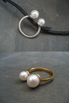 This ring was hand carved out of wax and cast in solid .925 sterling silver, followed by a 18k gold plating. On top are 2 genuine cultured pearls that are nestled in a cup. The larger pearl measures approx. 8mm the smaller one 6.5mm. Please note that size and color may slightly vary, since these are natural pearls. Available in sterling silver and 18k gold plating over sterling silver. Please choose from the drop down list at checkout. Solid 14k gold available upon request ==&#x... Elegant Hand Forged Open Ring Jewelry, Elegant Hand Cast Jewelry For Anniversary, Elegant Hand-cast Jewelry, Hand Cast Open Ring Formal Jewelry, Hand Cast Open Ring For Formal Occasions, Elegant Hand Cast Open Ring Jewelry, Elegant Hand-cast Open Ring Jewelry, Unique Pearl Jewelry For Anniversary, Elegant Handmade Gold Pearl Ring