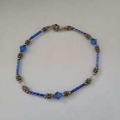 Brand New Blue And Silver Beaded Bracelet With Magnetic Closure. Casual Blue Bracelets With Faceted Beads, Casual Blue Beaded Bracelet With Faceted Beads, Casual Blue Faceted Beaded Bracelets, Casual Blue Bracelet With Faceted Beads, Casual Blue Faceted Beads Bracelet, Blue Beaded Crystal Bracelet For Jewelry Making, Blue Beaded Bracelets With Lobster Clasp For Gift, Blue Crystal Bracelet With Silver Beads, Elegant Blue Crystal Bracelet With Silver Beads