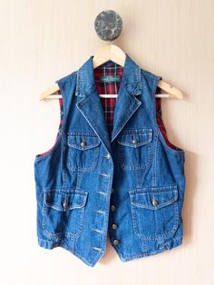 Vintage Ralph Lauren denim vest. Plaid flannel lining. Collared and buttons up. Size tag missing.  20" ptp 19" waist 21"length Ralph Lauren Vintage, Ralph Lauren Denim, Vintage Ralph Lauren, Ralph Lauren Jeans, Plaid Flannel, Denim Vest, Size Tag, Button Up, Jackets & Coats