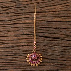 Indian Bridal Traditional One Gram Jewelry Tikka Height = 130 mm || Width = 32 mm Chand Style Antique Maang Tikka Gorgeous 24 K gold plated. Whether you are the bride or sassy bridesmaid, no lehenga is complete without a maang tikka. This Kundan pearl maang tikka is perfect to steal the show with its elegance . The meticulous attention paid to the craftsmanship makes it an epitome of jewelry inspiration. 100% Satisfaction Guarantee: Long Lasting Plating, High-Quality Stones. Gifting: This pair o Ceremonial Temple Jewelry Tikka With Stone Work, Temple Jewelry Style Ceremonial Tikka, Festival Temple Jewelry Tikka With Stone Work, Kundan Temple Jewelry Tikka For Rituals, Temple Jewelry Tikka With Cutdana For Gifts, Temple Jewelry Tikka With Stone Work, Festive Temple Jewelry Tikka With Motifs, Temple Jewelry Round Tikka With Cutdana, Temple Jewelry Chandbali Tikka For Rituals