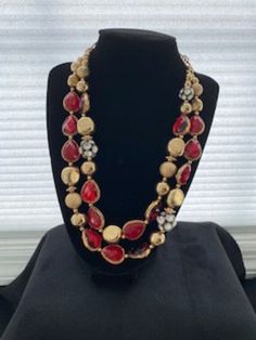 Beautiful vintage necklace is 22 inches long with double strands having glittering red glass and gold-tone balls and chain.  The necklace comes with a bonus bracelet.  The ensemble is perfect as a gift, holiday jewelry, formal wear or adding elegance to a day outfit. Holiday Gold Beaded Jewelry, Elegant Gold Beaded Necklaces For Valentine's Day, Elegant Evening Holiday Jewelry, Elegant Beaded Jewelry For Holidays, Formal Gold Beaded Necklaces, Gold Round Beads Jewelry For Christmas, Formal Red Beaded Jewelry, Elegant Gold Jewelry For Holidays, Elegant Gold Jewelry For Holiday