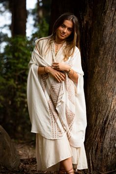 The Free Mind Kimono is designed to be light and breezy. Featuring a unique, tribal block print and made with natural colours and fibres. This kimono is a beautiful addition to a bohemian wardrobe, perfect to drape over an outfit to add a touch of alternative style. Material : 100% Cotton Hand made with Love ❀ Bohemian Beige Kaftan For Beach Cover-up, Beige Bohemian Long Kimono, Beige Long Bohemian Kimono, Bohemian Beige Kaftan For Festival, White Boho Print Kimono For Festival, Bohemian Beige Kimono For Beach Cover-up, Bohemian Beige Kimono For Festival, Bohemian Poncho With Kimono Sleeves For Summer, Beige Bohemian Kimono For Beach Cover-up