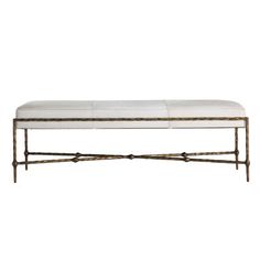 a bench that is made out of metal and has a white upholstered seat