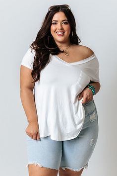 - Keep your look simple but stylish in our Casual Convo Shift Tee - Soft unlined lightweight material with short sleeves - V-cut neckline and a single accent chest pocket - Flowy loose fitting silhouette that ends in a rounded hemline! Measurements 1XL : Bust 40", Hip 46", Length 28.5", Sleeve Length 6", Waist 42". 2XL : Bust 42", Hip 48", Length 29", Sleeve Length 6.5", Waist 44". 3XL : Bust 44", Hip 50", Length 29.5", Sleeve Length 6.5", Waist 46". White V-neck Tops With Pockets, Accent Chest, Impressions Online Boutique, V Cut, V Cuts, Women Clothing Boutique, Online Womens Clothing, Boutique Clothing, Length Sleeve