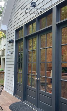 the front door of a house with glass windows