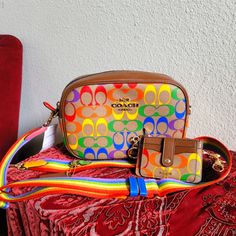 Show Off Your Pride With This Magnificently Stylish Camera Bag & Matching Wallet. Colors Are Bright And Bold And Definitely Stand Out From The Crowd. If You Like It Please Make A Reasonable Offer As I Am Advertising This On Multiple Sites Coach Saddle Bag, Stylish Camera Bags, Coach Crossbody Purse, Black Crossbody Purse, Vintage Leather Bag, Fancy Bags, Bags Coach, Granola Girl, Canvas Crossbody Bag