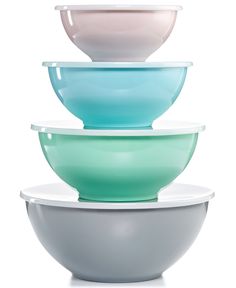 three bowls stacked on top of each other in different colors and sizes, one is empty