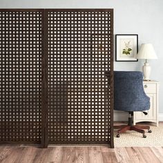 a room divider made out of wood with an open design on the top and bottom