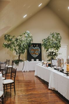 a banquet hall with tables and chairs set up